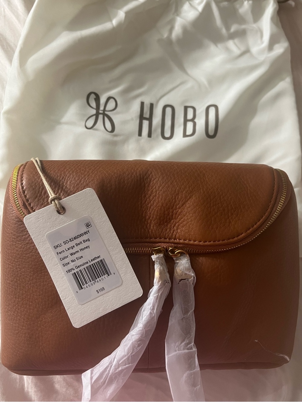 HOBO Fern Large Belt Bag
Pebbled Leather WARM HONEY Belt Bag with Tassel Zips - Picture 2 of 14